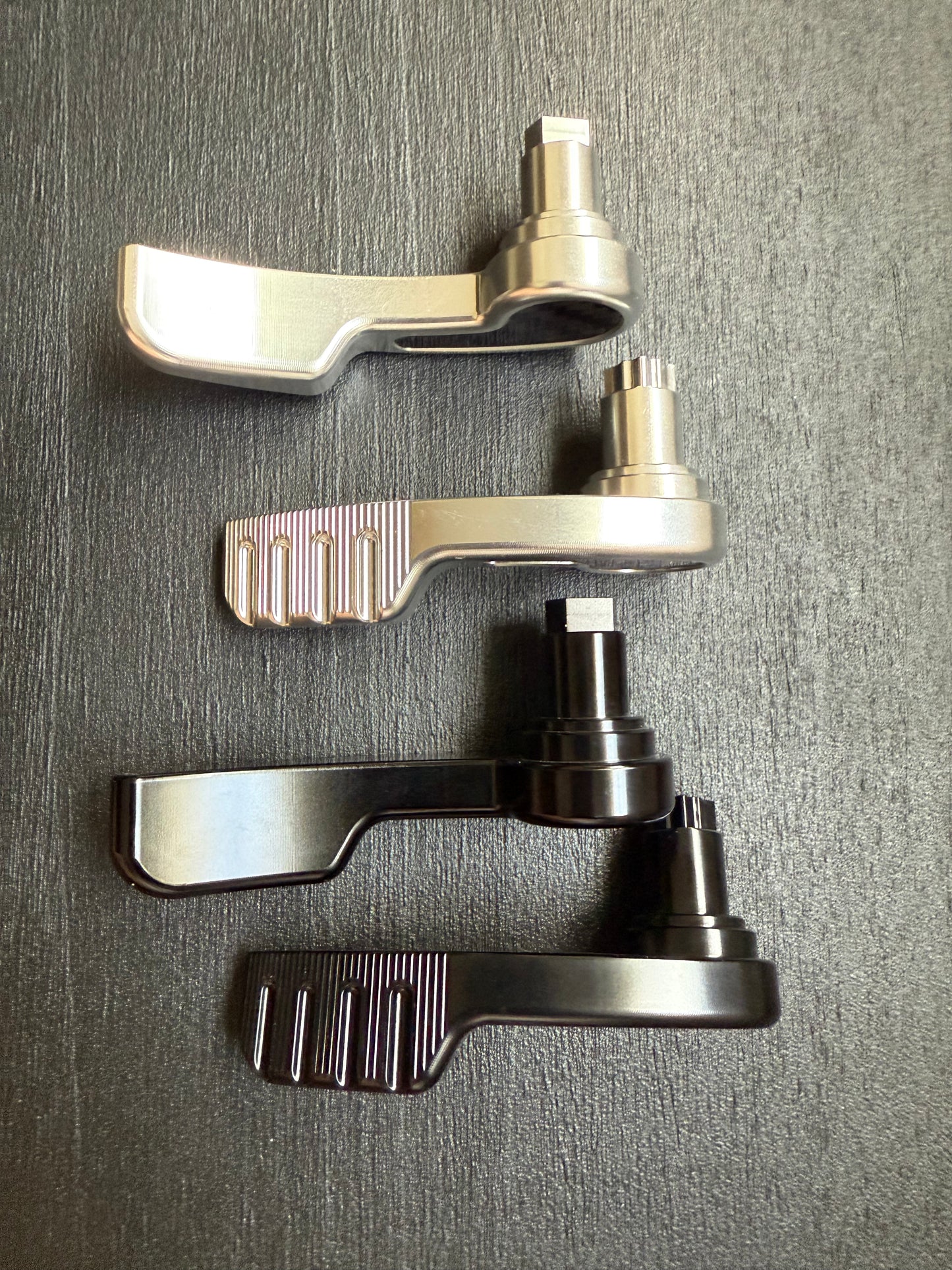 14+ Touring saddlebag levers with carbon fiber insert